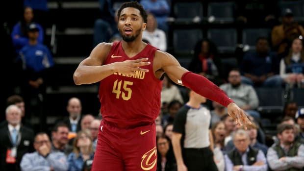 Feb 1, 2024; Memphis, Tennessee, USA; Cleveland Cavaliers guard Donovan Mitchell (45) reacts after a three point basket during the second half against the Memphis Grizzlies at FedExForum.